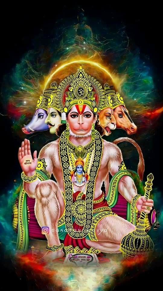 the hindu god sitting in front of two cows and holding his hands up with one hand