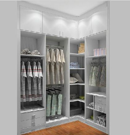 an open closet with clothes and other items in it