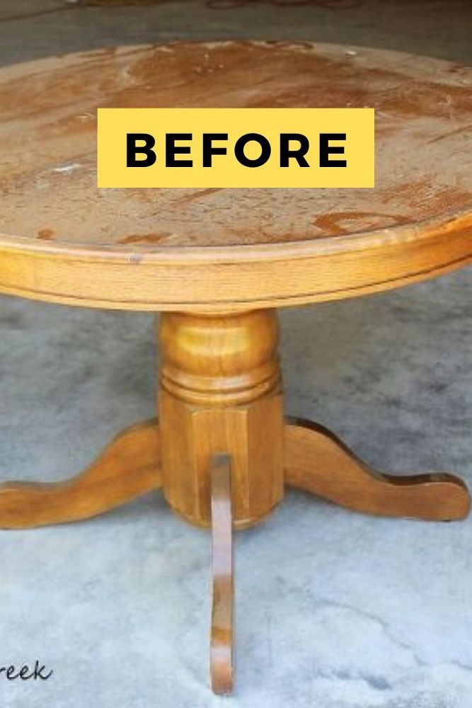 a table that has been turned into a coffee table with the words before painted on it