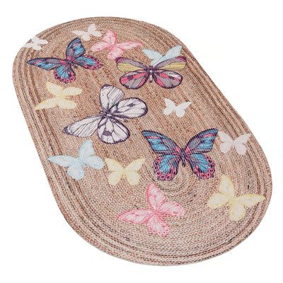 an oval shaped rug with butterflies on the top and bottom, is shown in multicolors