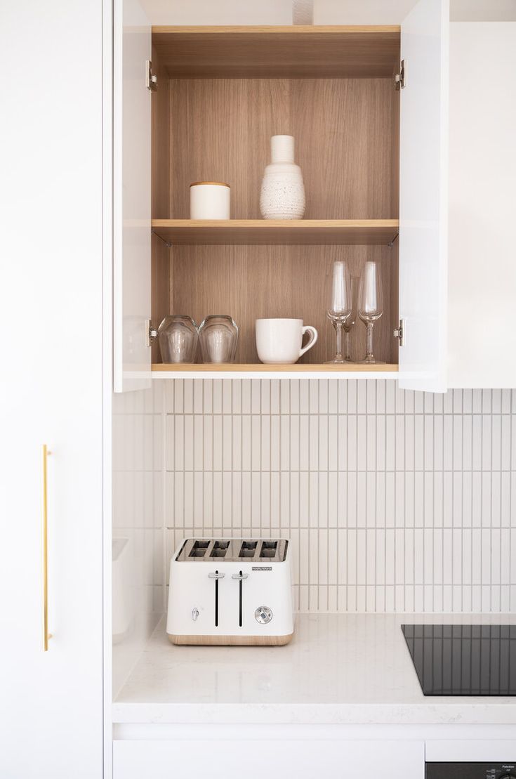 an instagram page showing the kitchen's toaster and coffee maker