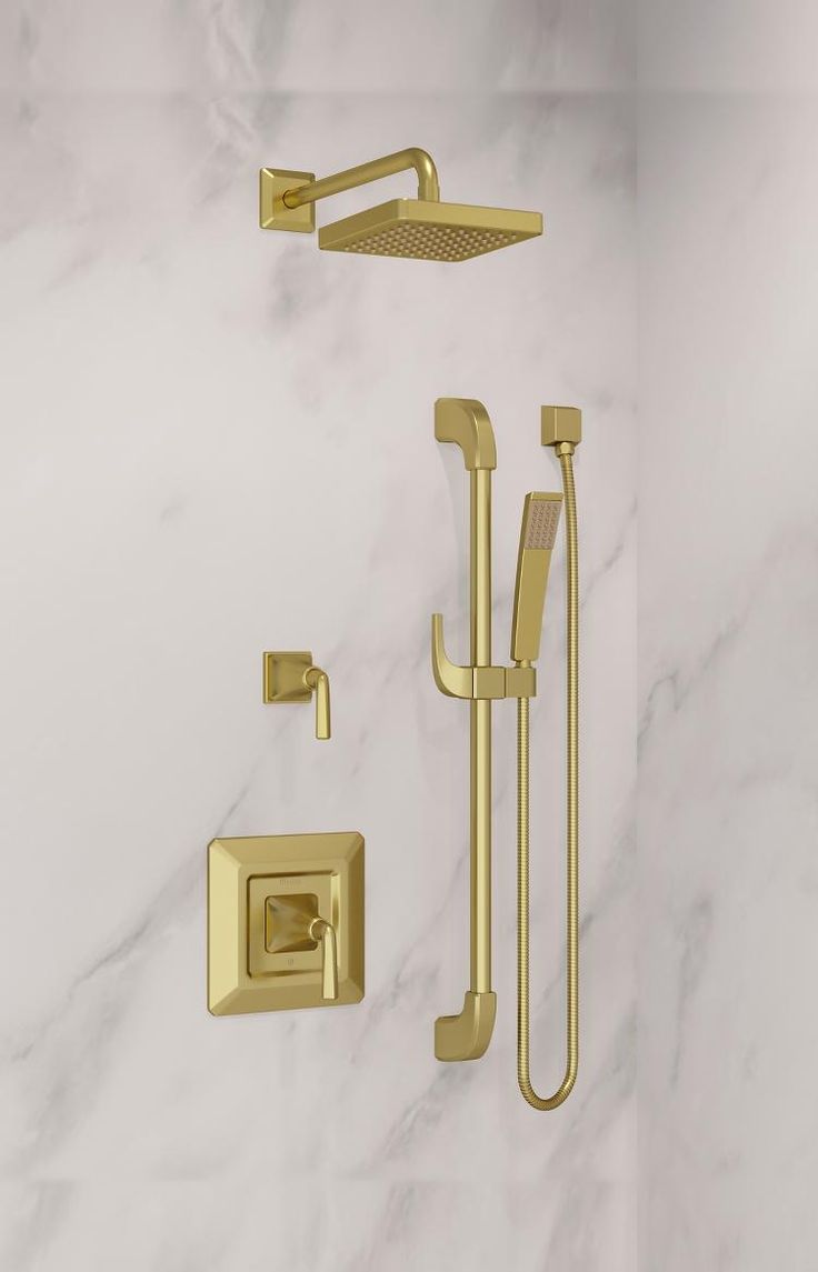 a gold shower faucet with thermostaer, hand shower head and handset