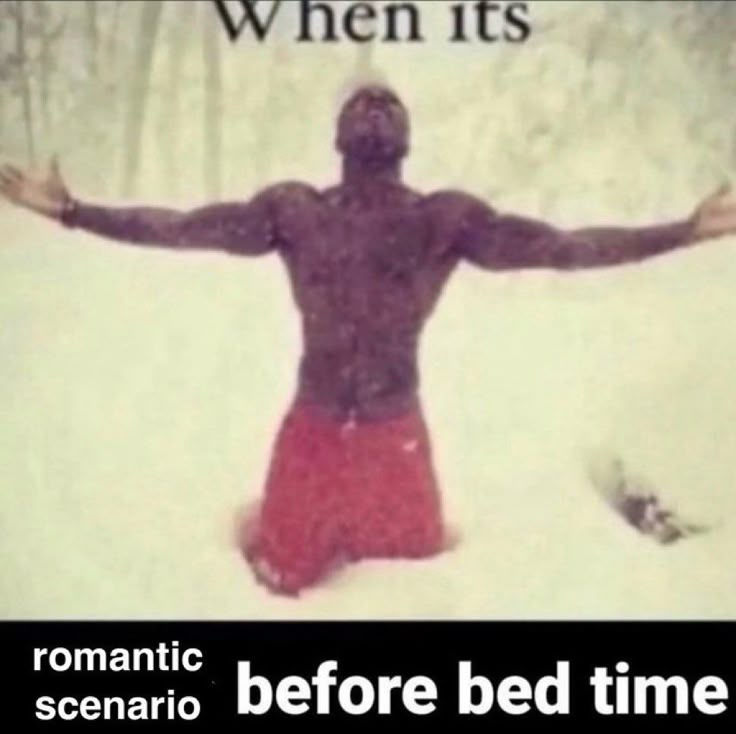 a man standing in the snow with his arms spread out to say, when it's romantic, before bed time