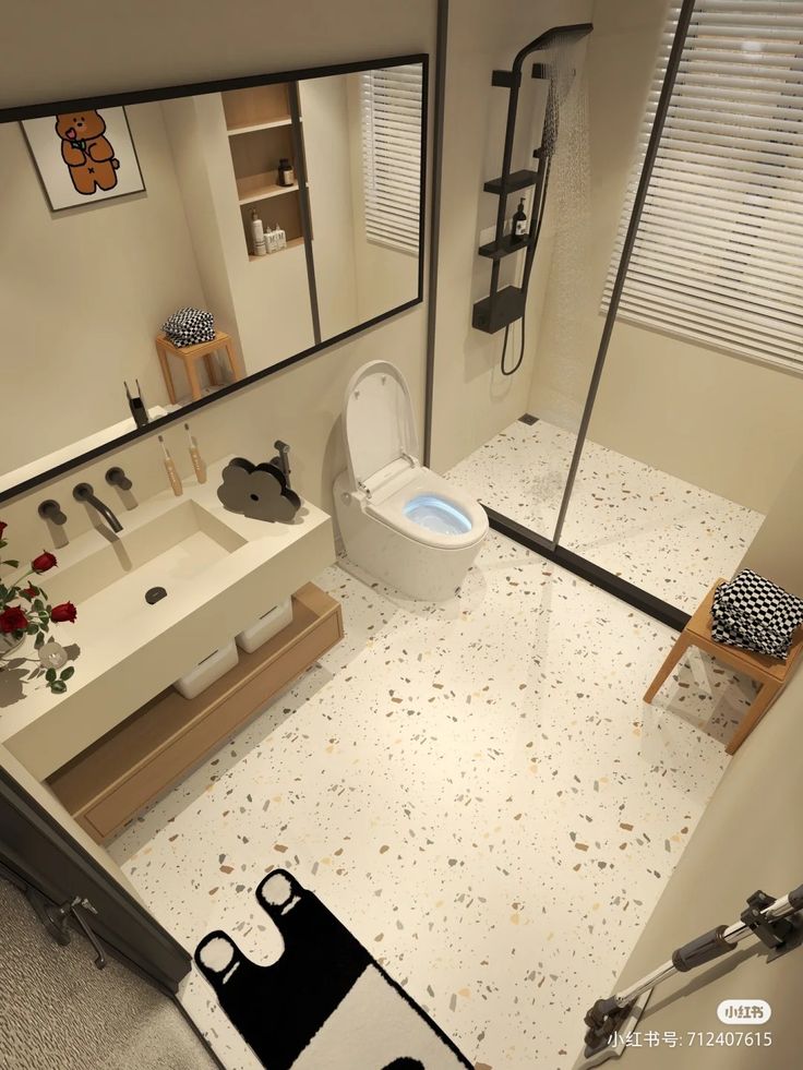 a bathroom with a toilet, sink and shower in the middle is shown from above