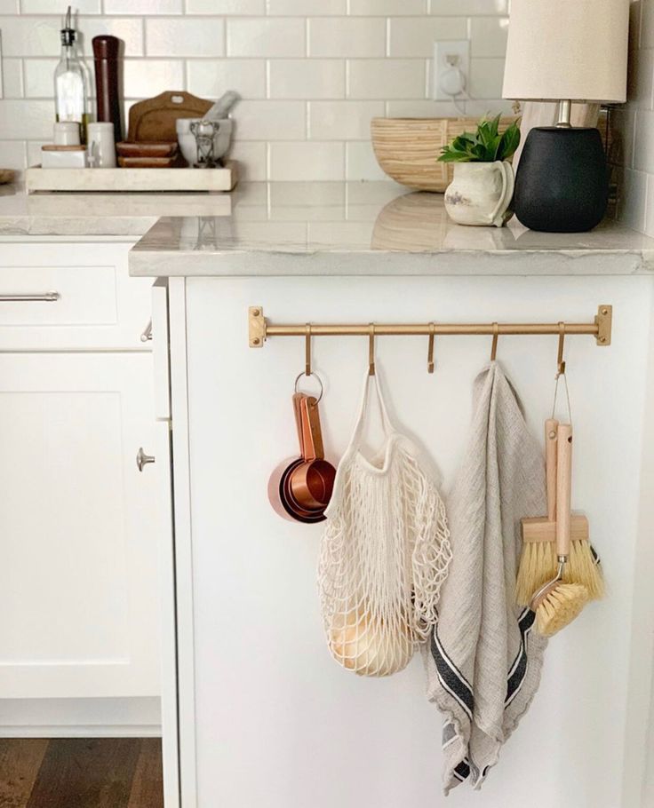 the kitchen counter is clean and ready to be used as a spice rack for cooking utensils