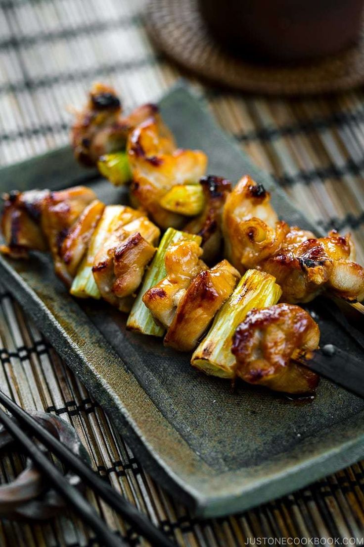 grilled chicken and vegetable skewers on a plate