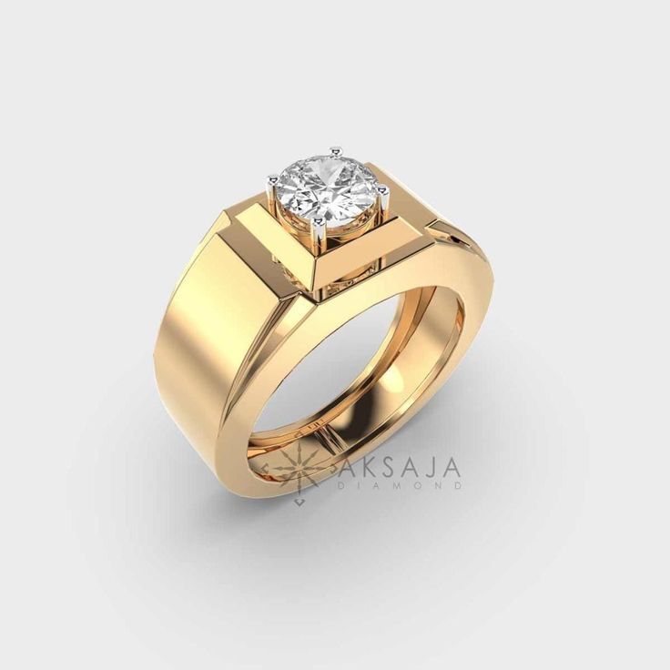 a yellow gold ring with a diamond in the center