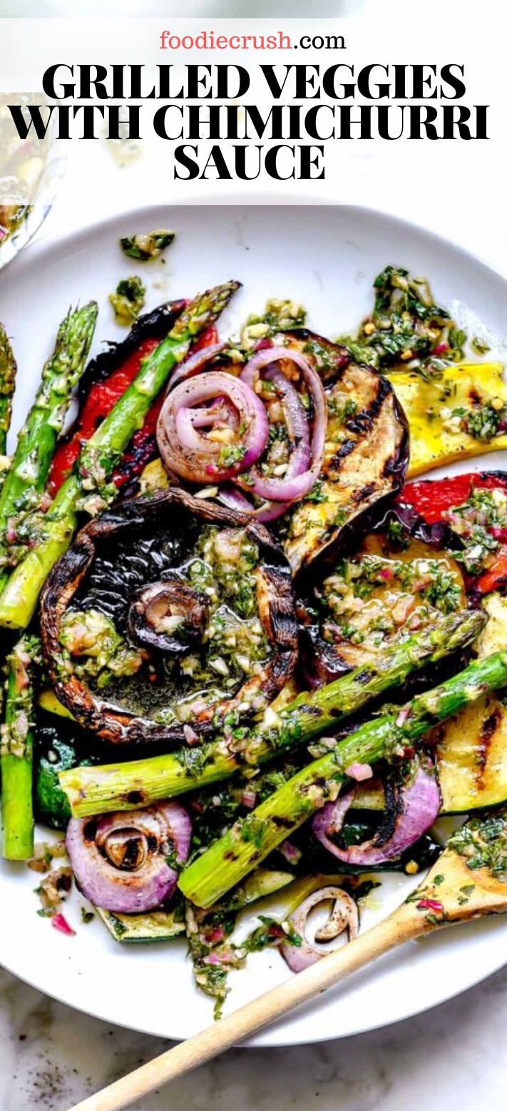 grilled veggies with chimica sauce on a white plate next to chopsticks