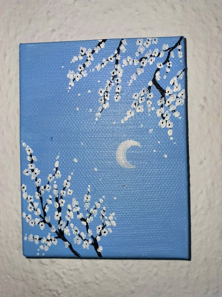 a painting of a tree with white flowers in the foreground and a half moon in the background