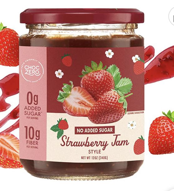 a jar of strawberry jam surrounded by strawberries