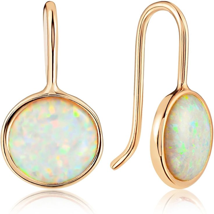 PRICES MAY VARY. STYLISH DESIGN - These premium quality women's created opal earrings make a classic fashion statement and can be dressed up or down. Style these boho simulated opal gemstone womens earrings as cute lightweight dangles for everyday wear, or an elegant finishing touch to a wedding look. SUPERIOR QUALITY - Every detail has been fine-tuned for maximum quality, longevity, and comfort. Approximate Measurements: 0.8 inch total length with a 8mm bezel-set stone. Hypoallergenic chain pla Simple Gold Earrings, Blue Opal Earrings, Dainty Gold Earrings, Womens Earrings, Gold Earrings For Women, Wedding Look, Gold Pearl Earrings, Hanging Earrings, Drop Dangle Earrings