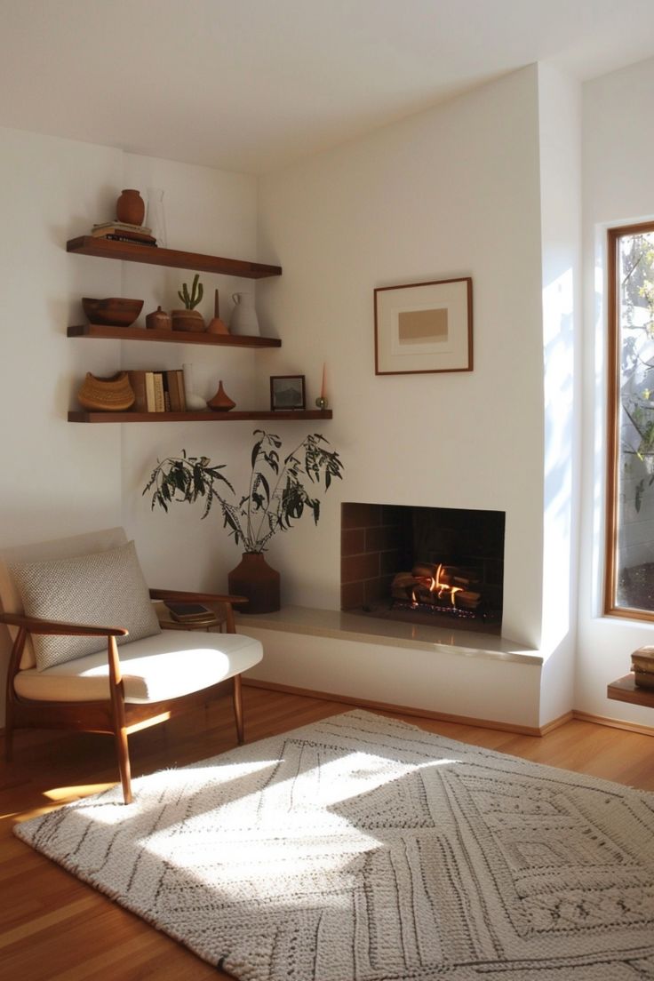 a living room with a fire place in the corner and shelves on the wall above it