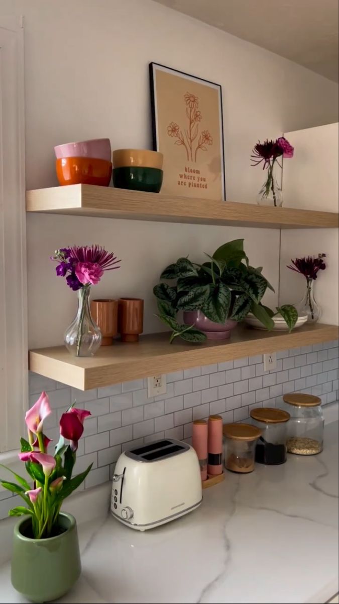 the kitchen counter is clean and ready to be used as a planter for flowers