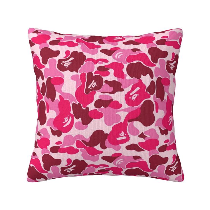 a pink and red pillow on a white background