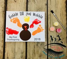 a thanksgiving card with the words gobble till you wobble my first thanksgiving on it