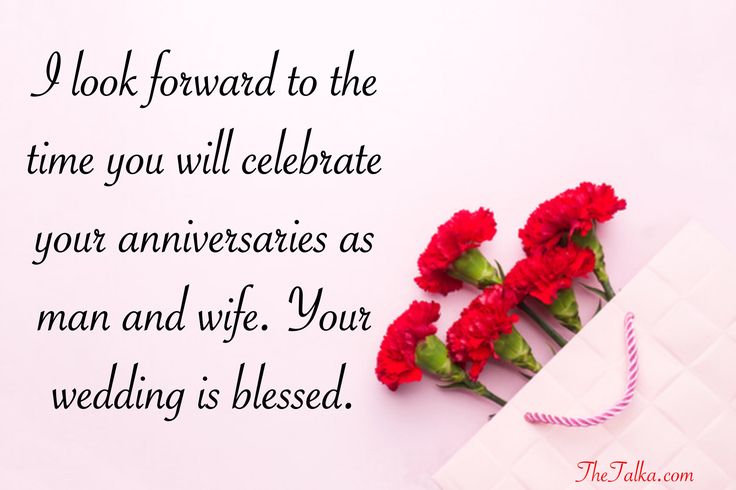 red carnations are tied to a white gift bag with the words, i look forward to the time you will celebrate your anniversary as man and wife