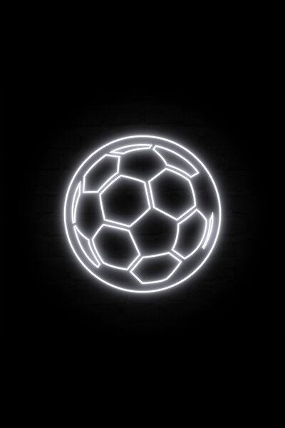 a glowing soccer ball in the dark