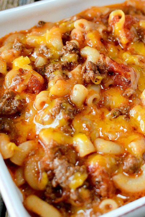 a casserole dish with meat and cheese in it