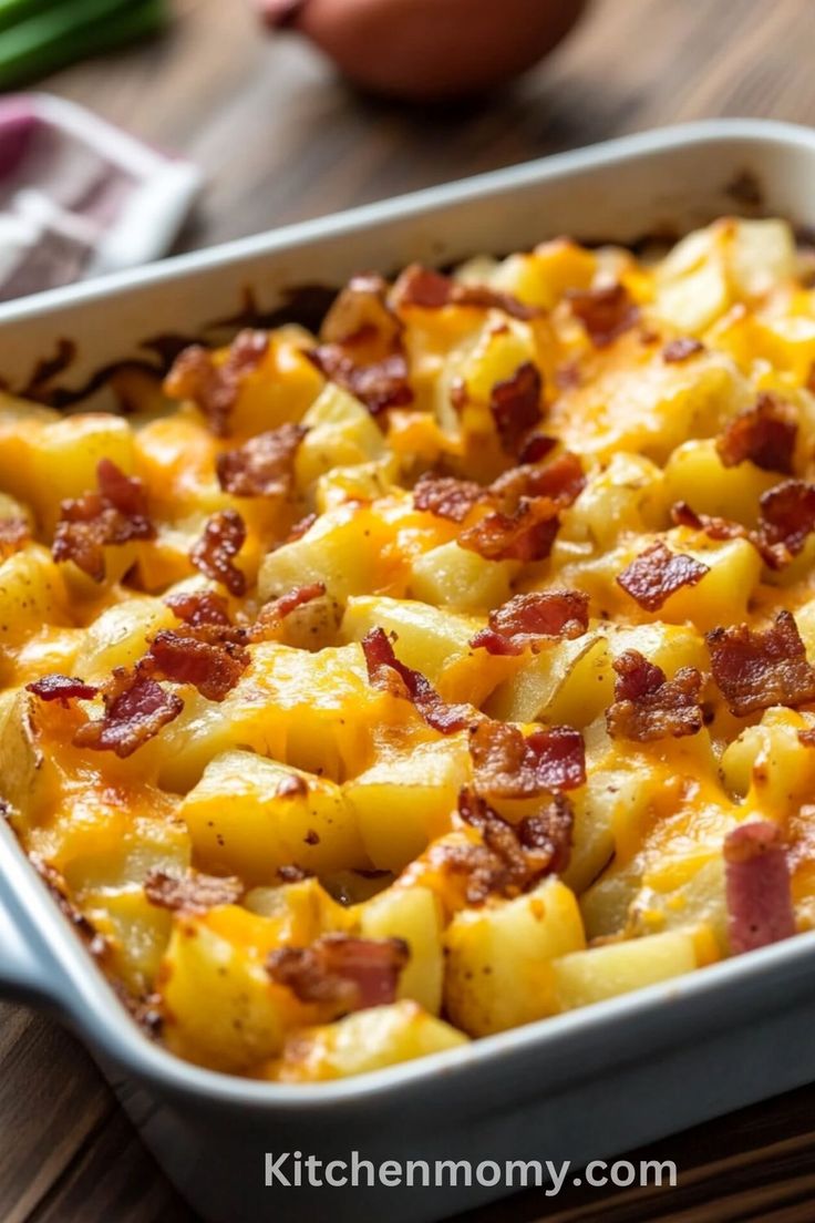 a casserole dish with potatoes and bacon in it