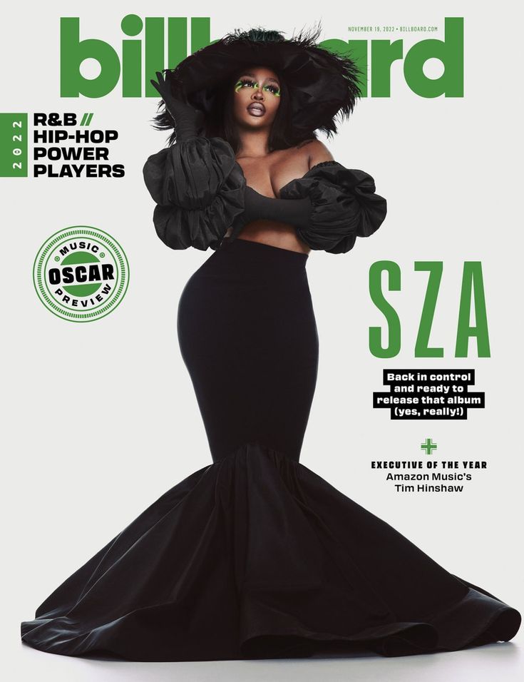 the cover of billboard magazine features a woman in a black dress and feathers on her head