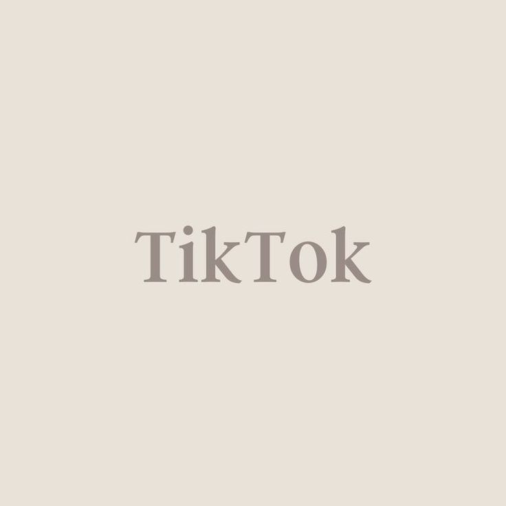 the word tiktok is written in grey on a white background