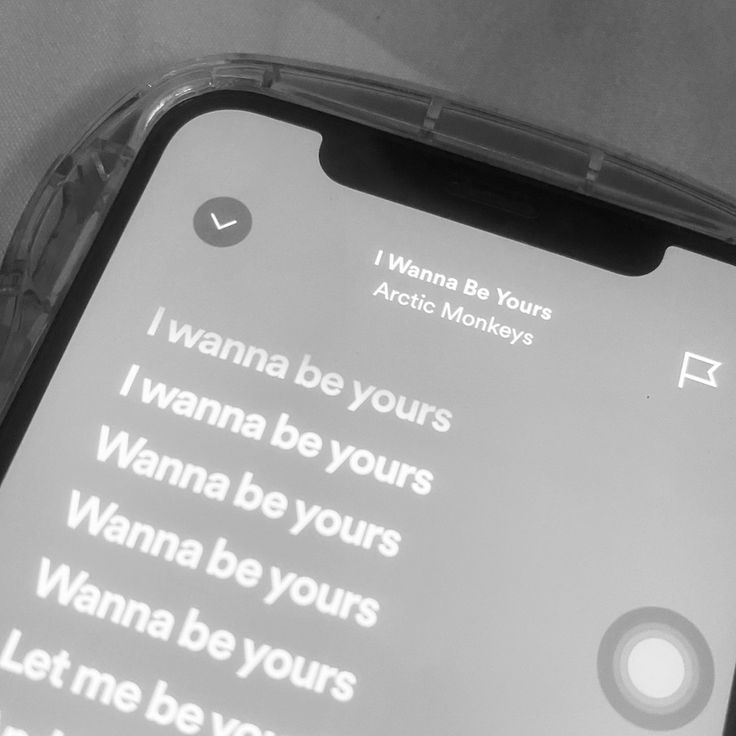 a cell phone with the text wanna be your arctic monkeys on it's screen