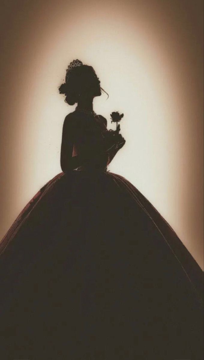 the silhouette of a woman in a dress holding a flower