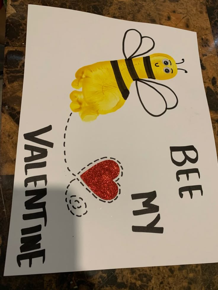 a sign with a bee on it that says i love my valentine