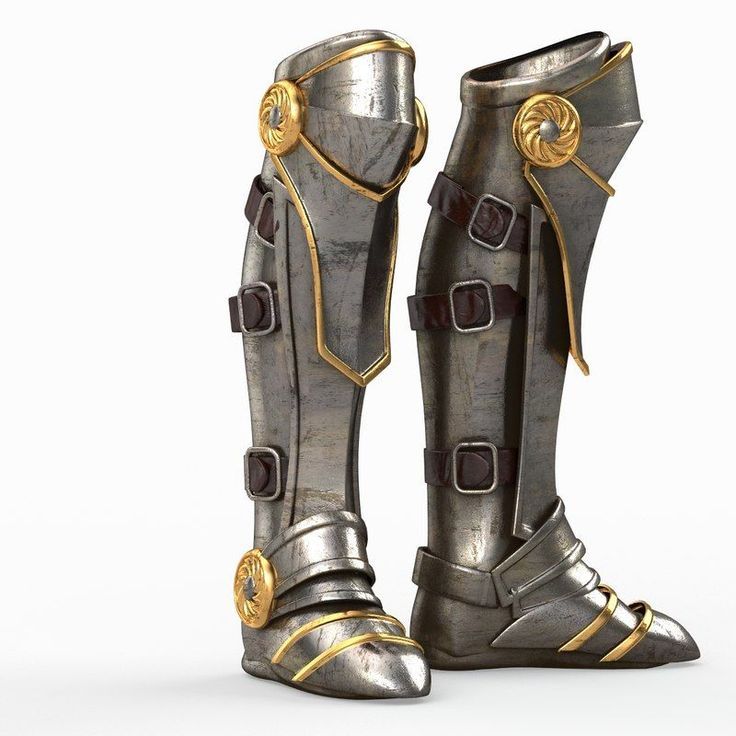 a pair of metallic boots with gold accents and buckles on the sides, standing in front of a white background