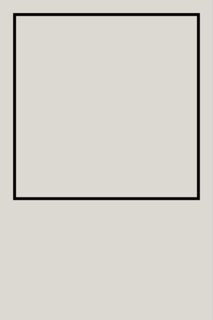 an empty square in the middle of a gray wall with black lines going through it