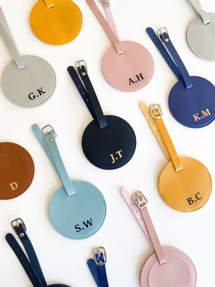 Our personalised luggage tags are all made to order! Personalise these travel luggage tags with your initials, perfect for a gift or personal usage added with style!  Available in colours pink, light blue, black, dark blue, brown, mustard and grey.  Choose between one side or two side print with synchronised gold OR black colour heat transferred vinyl. PRODUCT DETAILS: - Strong and durable PU leather tag with silver metal buckle.  - Each strap contains four buckle holes to easily adjust length. Personalized Black Luggage Tag For Travel, Personalized Adjustable Luggage Tag For Travel, Customizable Black Luggage Tag For Gift, Customizable Black Luggage Tag As Gift, Customizable Black Luggage Tag Gift, Customizable Black Luggage Tag For Personalized Gift, Luggage Tag, Travel Themed Gifts, Brown Mustard