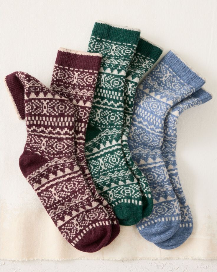 Warm up to winter in these cozy socks, featuring a Nordic-inspired Fair Isle pattern in a range of seasonal colors. Crafted in a luxurious blend of merino wool and cashmere that wicks moisture away for all-day comfort, with nylon and spandex for durability and shape-retaining stretch. Exclusive. Seamless toe construction. USA. Cozy Winter Socks, Comfortable Winter Socks With Fair Isle Pattern, Comfortable Fair Isle Pattern Winter Socks, Winter Nordic Knitted Socks, Nordic Knitted Winter Socks, Cozy Wool Socks For Winter, Cozy Winter Socks With Fair Isle Pattern, Scandinavian Style Winter Socks With Fair Isle Pattern, Nordic Warm Winter Socks