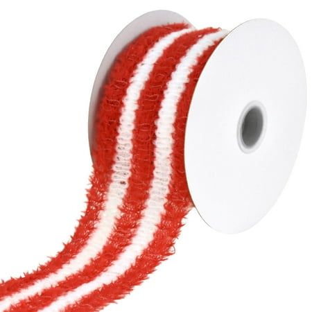 a roll of red and white striped ribbon