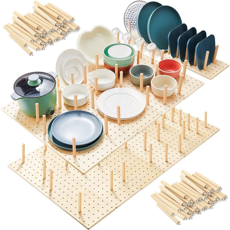 an assortment of plates and bowls are arranged on a peg board with wooden dows