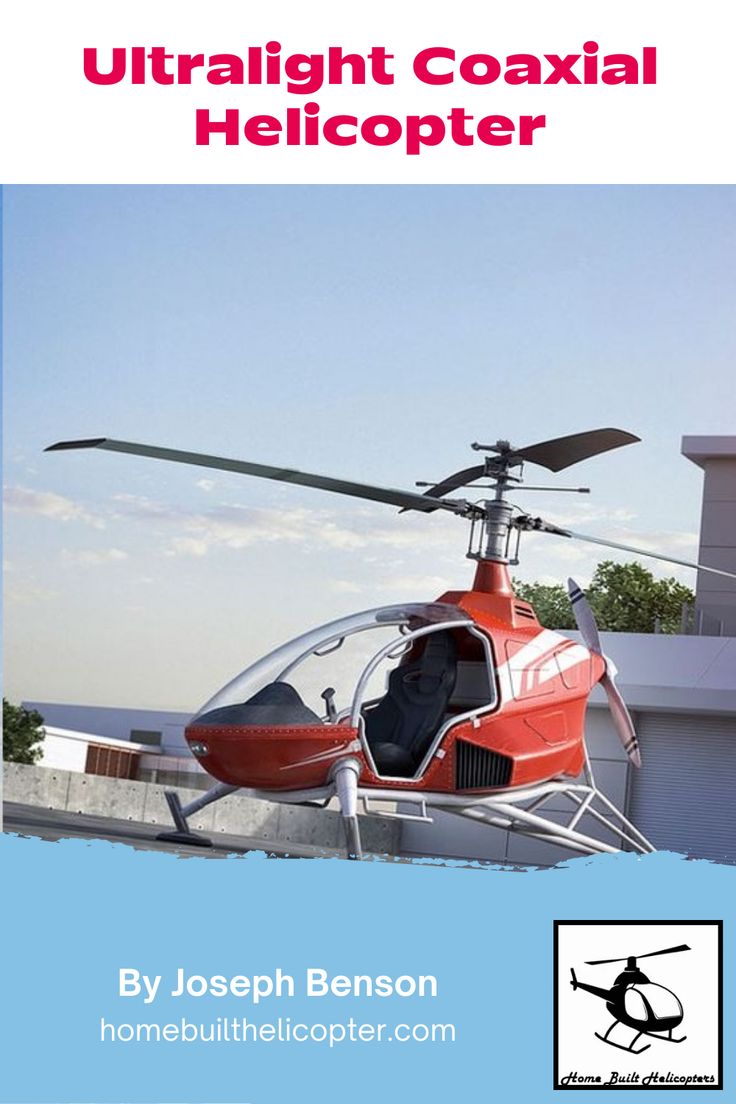 a red and white helicopter sitting on top of a building