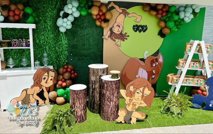 the lion and the mouse party is set up in front of a backdrop with balloons