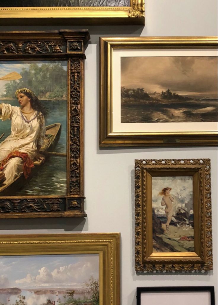 several paintings are hanging on the wall next to each other, including one with a woman in a boat