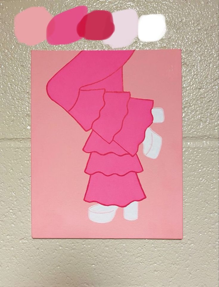 a piece of paper that has been cut out to look like a woman's dress