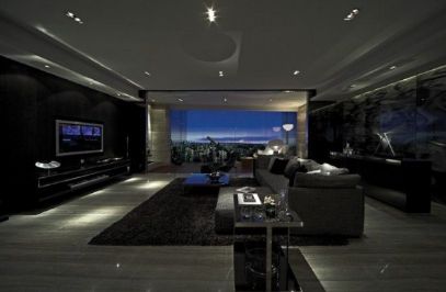 a living room filled with furniture and a flat screen tv