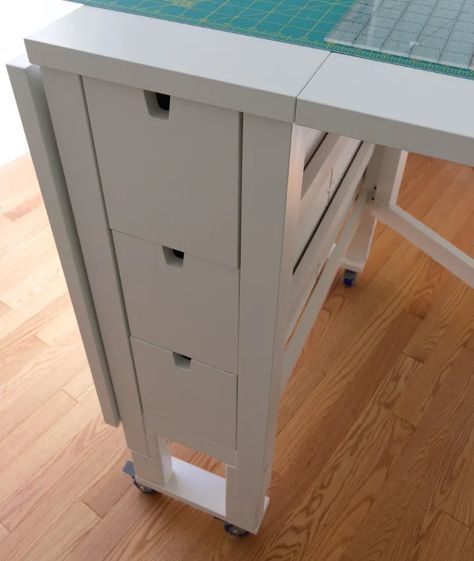 a table that has some drawers on it