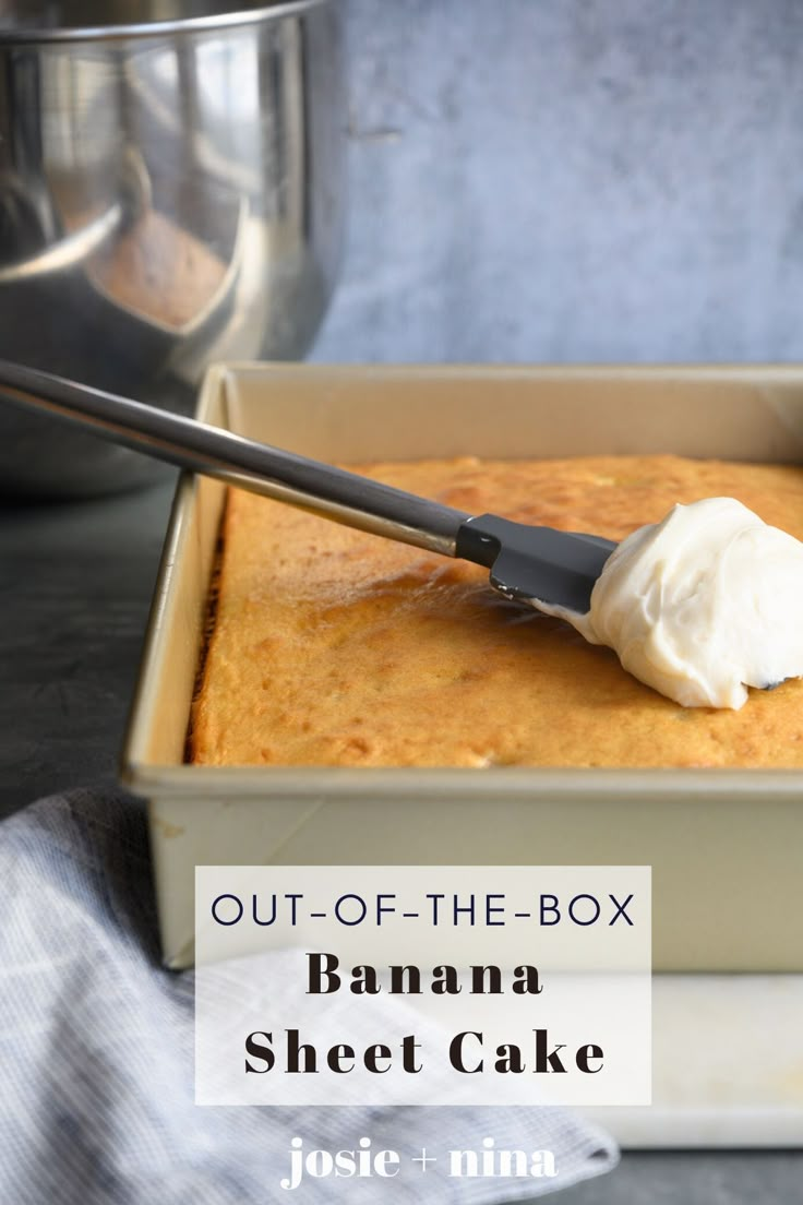 a banana sheet cake in a baking pan with a spatula on top and the title out - of - the - box banana sheet cake