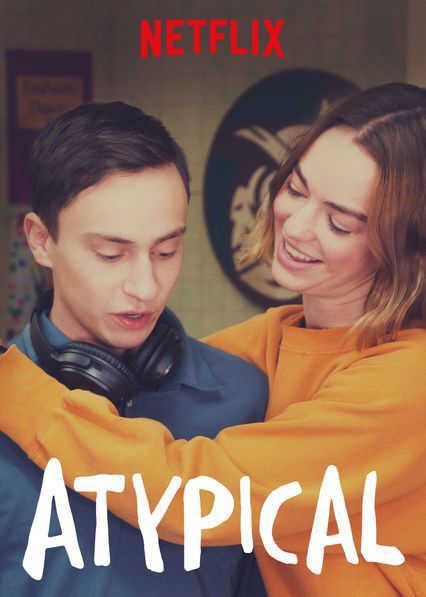 a man and woman standing next to each other with the words atypical on them