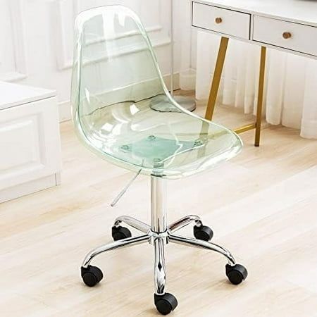 a clear office chair sitting on top of a hard wood floor next to a desk