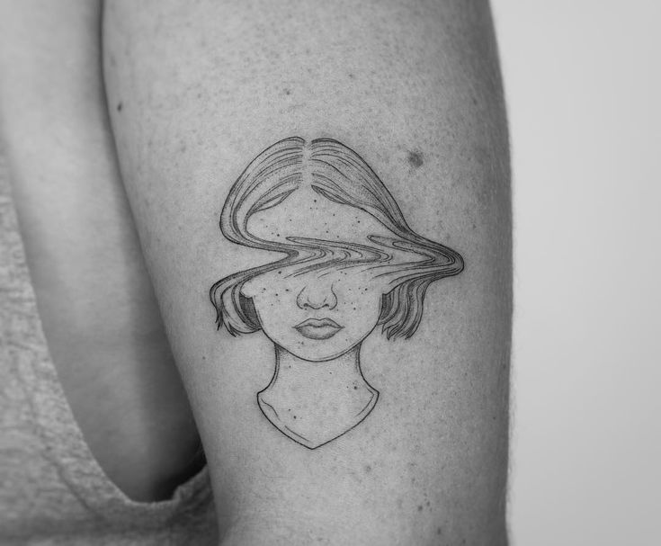 a woman with a hat on her head is shown in black and white tattoo art