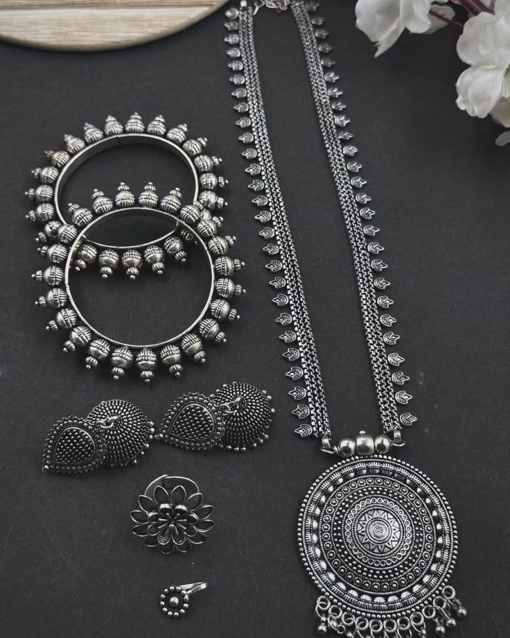 Do have a look on our authentic Oxidised Jewellery Set ��💗🌸 . 👉🏻 Swipe to see the varieties . Visit our website to order 🎀 Link in Bio 📎 . Also Follow us for such other exclusive offers and trendy designs 🤍 . #jewelleryset #necklace #ring #earrings #studs #bangles #kada #toerings #nosepin #jewelry #oxidisedjewellery #traditional #unique #fashion #indianjewellery #indiantraditionalwear #oxidize #accessories #style #trending #jewelleryofinstagram #onlineshopping #jewellerylovers #jewellerydesign... Oxidised Jewellery With Kurti, Oxidised Jewellery Set, Accessories Style, Necklace Ring, Oxidised Jewellery, Earrings Studs, Trendy Designs, Jewellery Set, Indian Jewellery