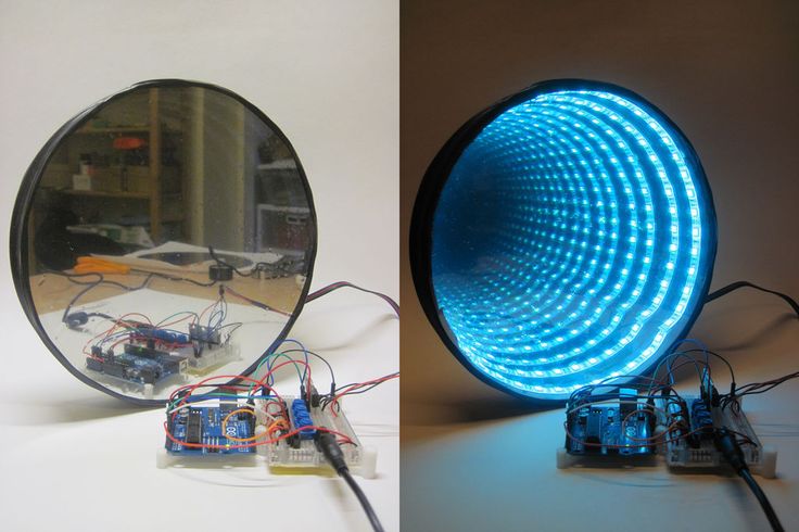 two different views of an electronic device and a round mirror with blue lights on it