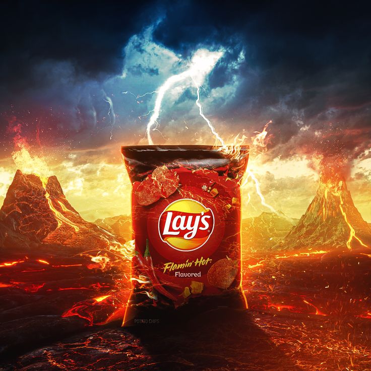 a bag of lays potato chips sitting on top of a lava fire covered ground with lightning in the background