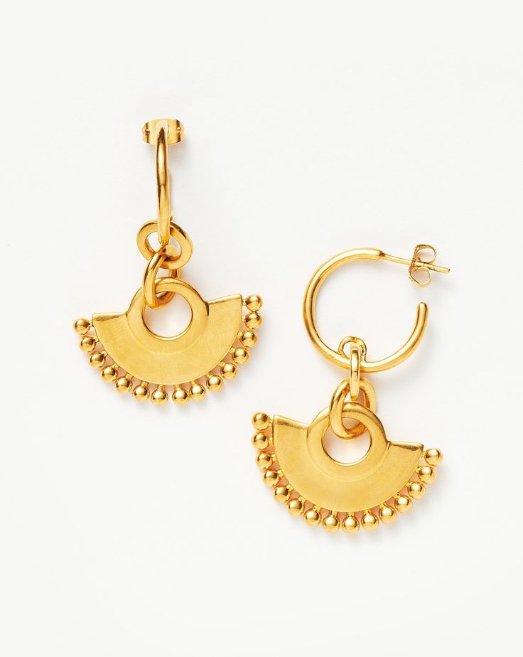 Zenyu Chandelier Hoop Earrings 18ct Gold Plated. The Zenyu Chandelier Hoops Echo Colombia's Rich Artistry and Heritage with a Modern Edge. Bobble-Trimmed Charms are Suspended from Dainty Hoops in a Brushed-Gold Finish. Looks Great Worn Solo or Teamed with Our Gold Chubby Huggies. Metal: 18Ct Gold Plated on Brass Dimensions: 48mm Total Length; Fan Charm 20 X 30 mm Weight: 16. 5 g Pair Yellow Gold Chandbali Hoop Earrings, Selling Earrings, Gold Huggies, Double Chain Bracelet, Fan Necklace, Malachite Necklace, Leaf Bracelet, Ear Stack, Monogrammed Items