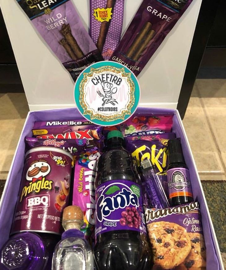 a purple box filled with snacks and condiments