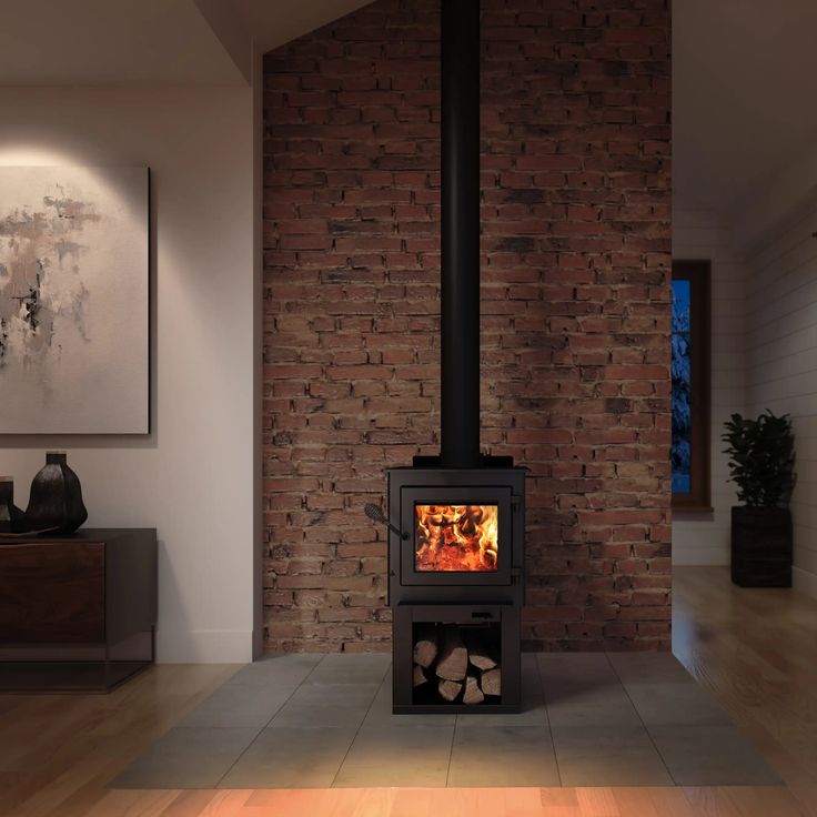 a wood burning stove sitting inside of a living room next to a painting on the wall